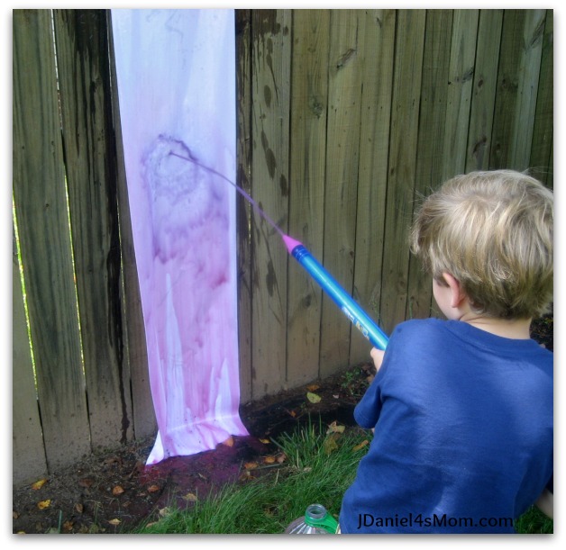 jdaniel4smom_red_white_boom_water_gun_painting_blue