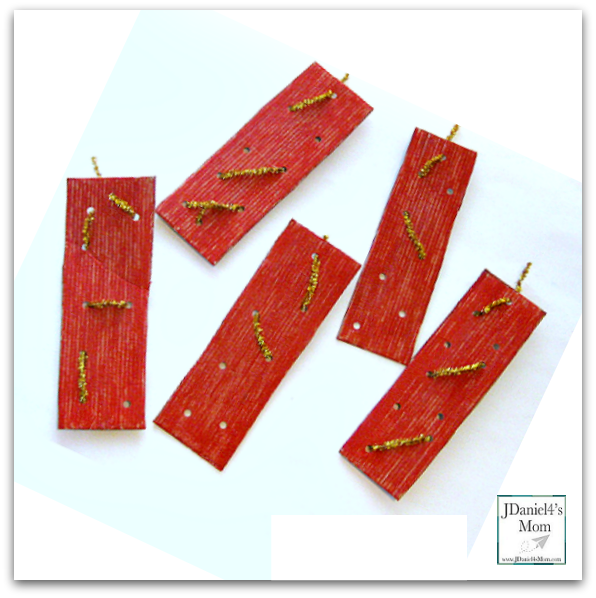 Five Little Firecrackers Craft and Song - This fine motor activity would be great to do for any patriotic holiday like the 4th of July. Kids can weave their own designs on the cardboard fire cracker they paint. Then they can use the to retell this fun rhyme.