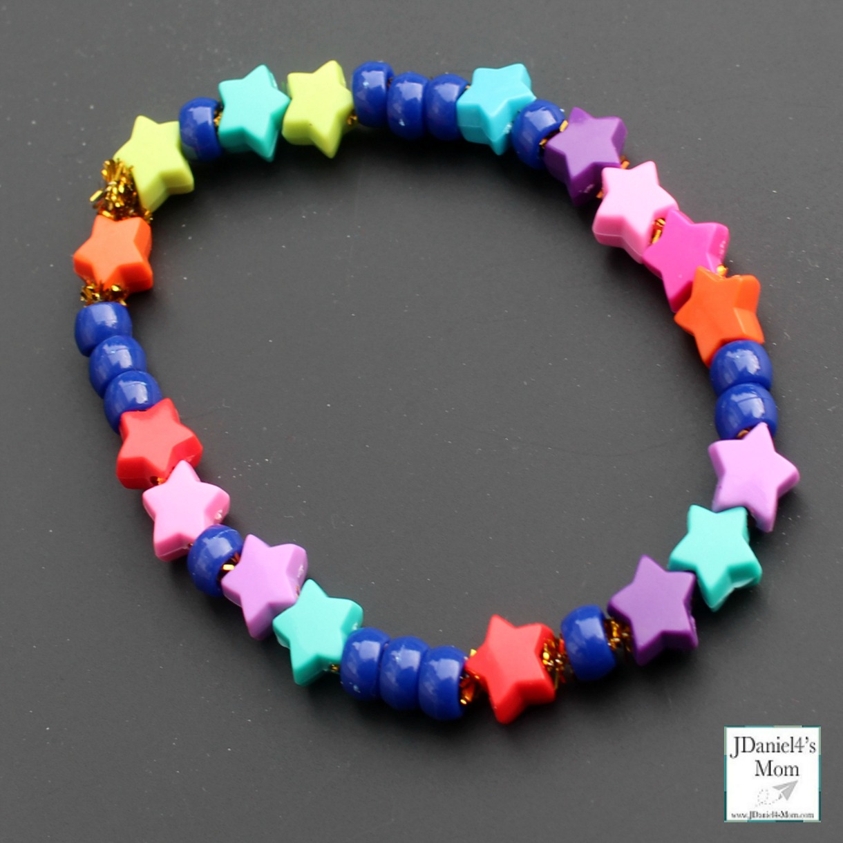 Binary Code Bracelet That is Out of This World STEM Activity -Beads on the free planning and reflection printable. This is what the finished bracelet look like.