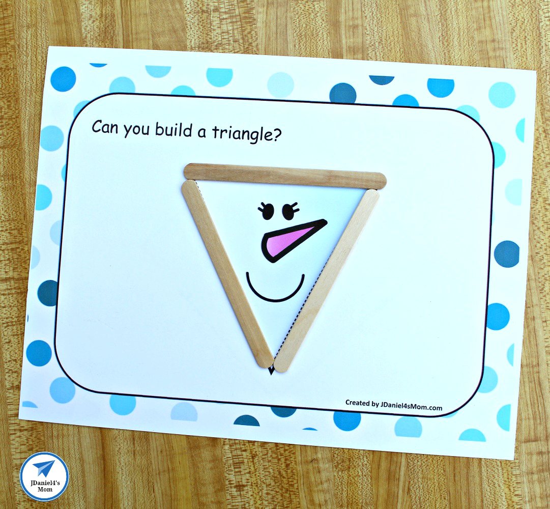 Building Shapes STEM Snowman Activity- This mat features a triangle shaped snowman.