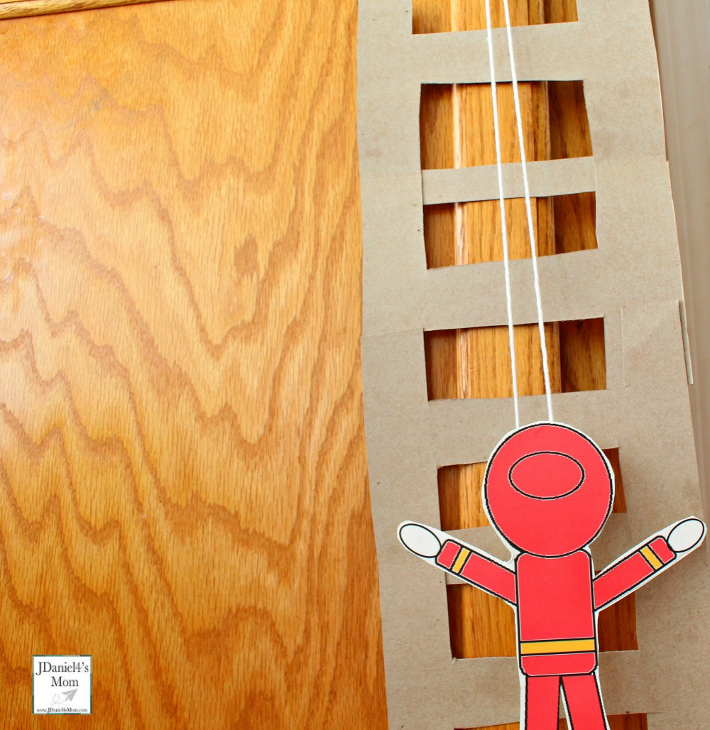 Climbing Firefighter STEAM Activity for Kids - Firefighter on the Lower Rungs