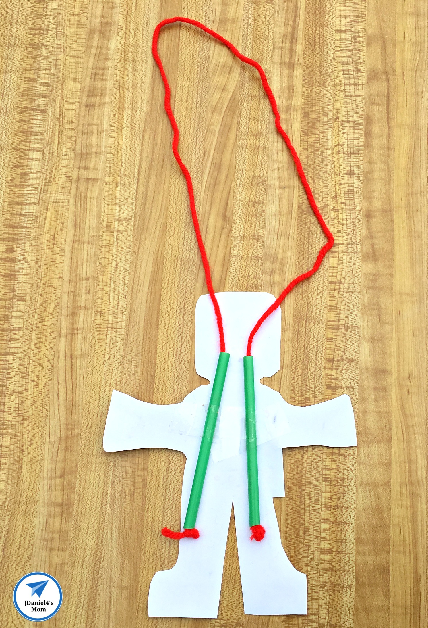 Flying Robot Printable STEAM Activity with Blockly Block Building Directions - Knots in the ends of the yarn.