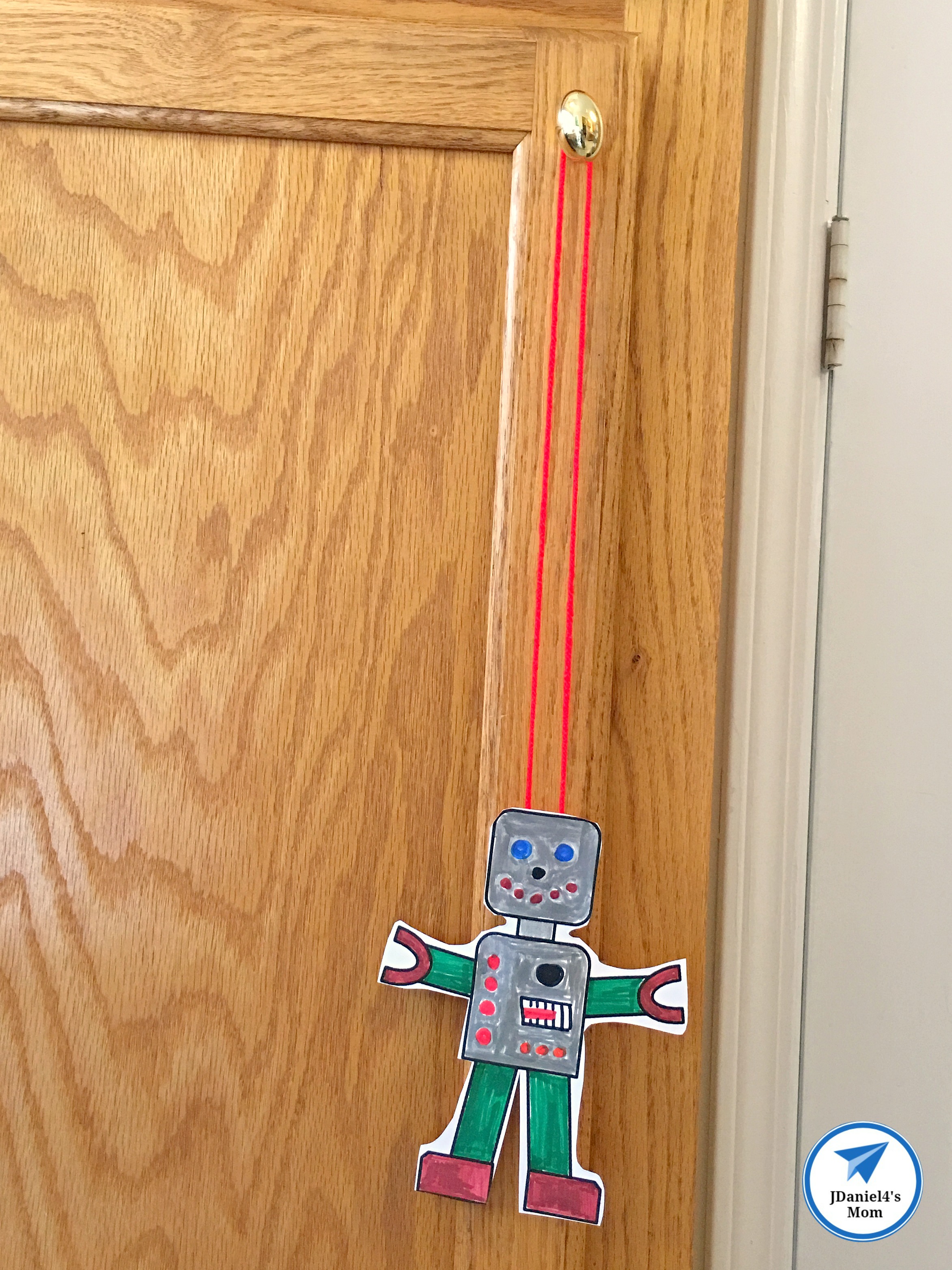 Flying Robot Printable STEAM Activity with Blockly Block Building Directions - Robot Hanging on a Knob
