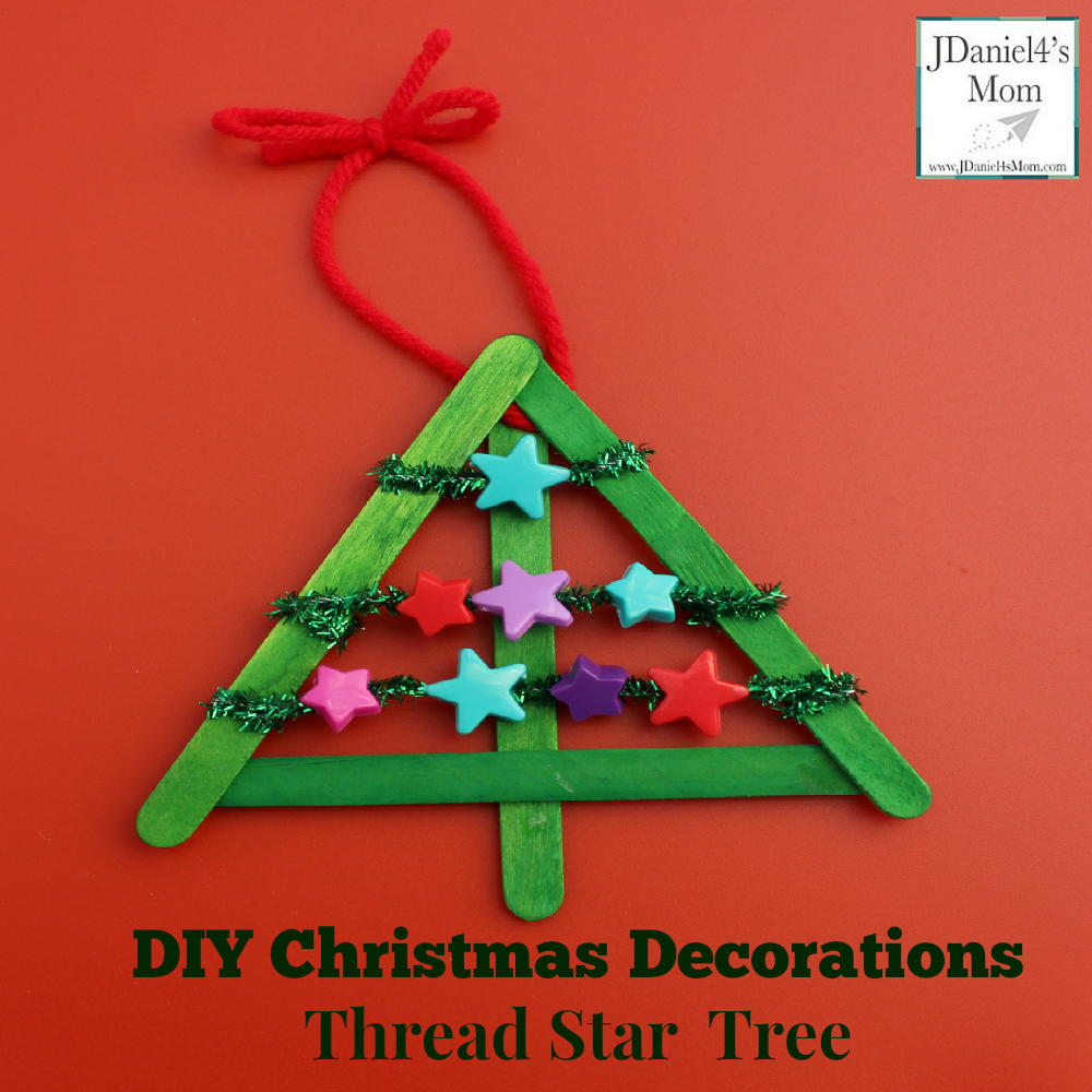 DIY Christmas Decorations Threaded Star Tree- Kids will get to work on their fine motor skills while creating this keepsake Christmas ornament. 