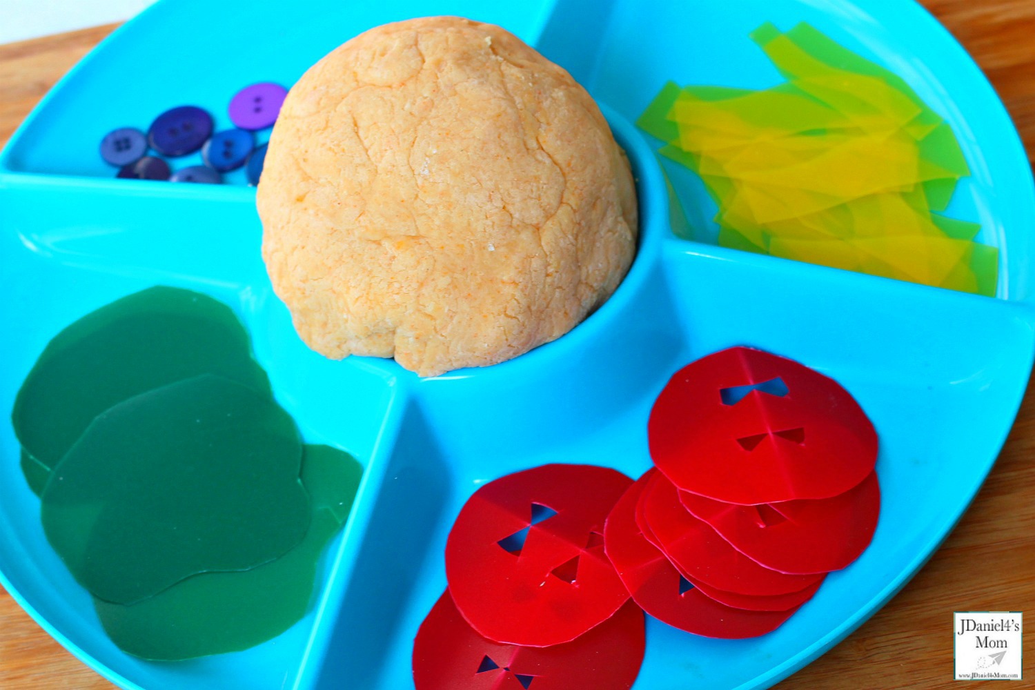 Dragons Love Tacos Themed Playdough Recipe and Activity - Children at home and students at school will have fun building dinosaurs sized tacos with taco scented playdough. This playdough recipe is so easy to make. This what the activity supplies look like.