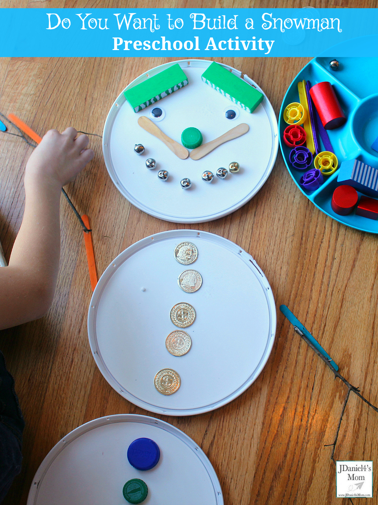Do You Want to Build a Snowman Preschool Activity- Three paint buckets lids and a bunch of household treasures and craft supplies are all you need for this creative play activity. It does't just have to been for preschoolers. Big kids will have fun building a snowman too.