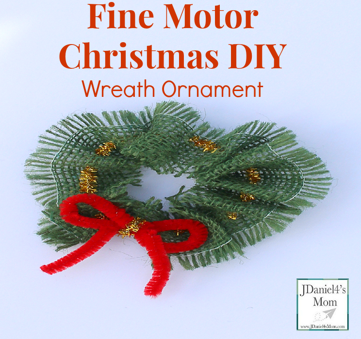 Fine Motor Skills: Christmas DIY Wreath Ornament- Kids can easily thread a pipe cleaner through burlap to create this Christmas Ornament.