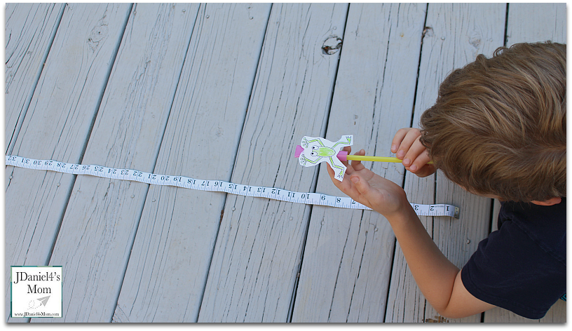 Leap Frog Straw Rocket with Printable - Blowing the Frog Down the Measuring Tape