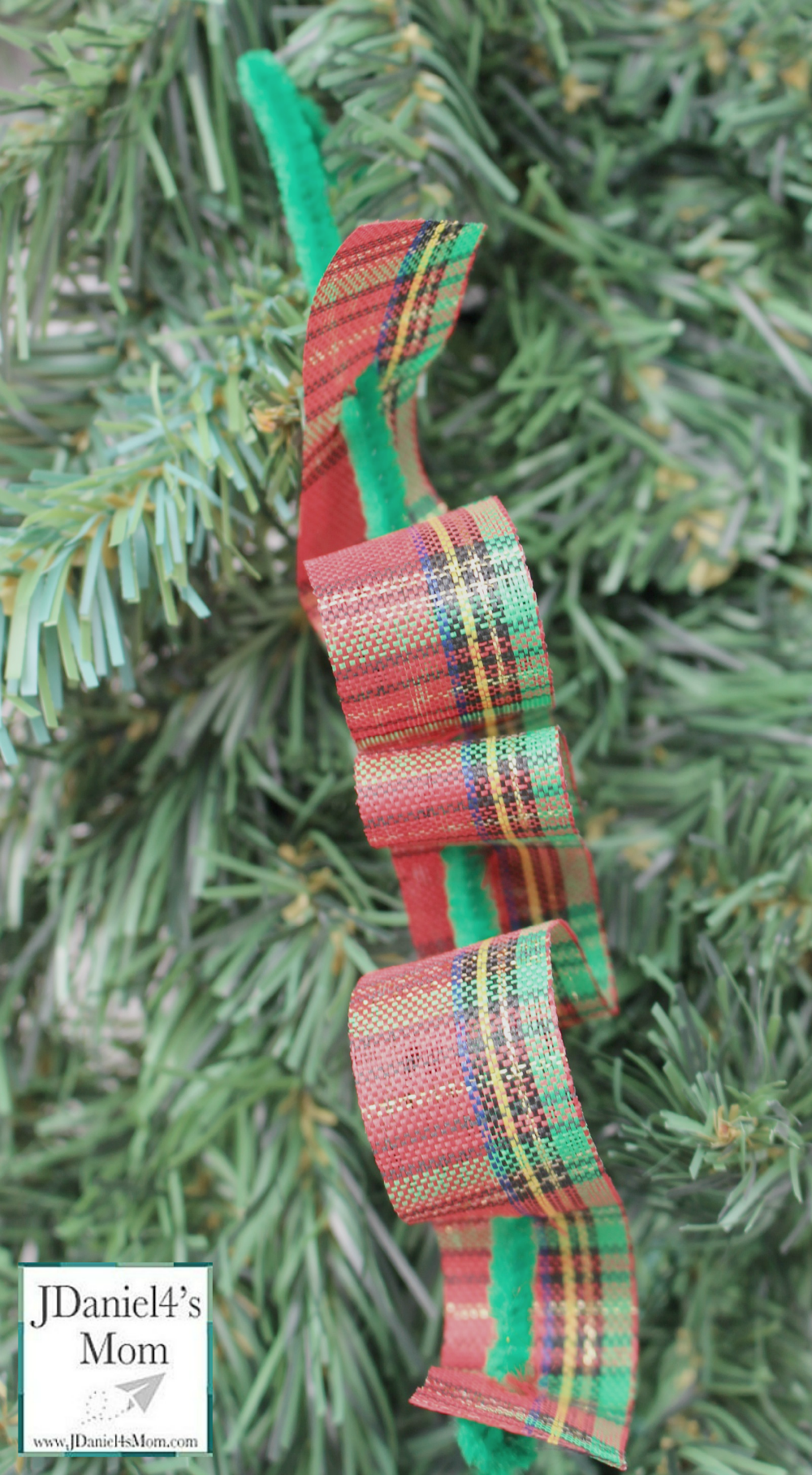 Ribbon Candy Homemade Ornaments- Fun fine motor craft for kids. They will have fun weaving pretty holiday ribbons through pipe cleaners.