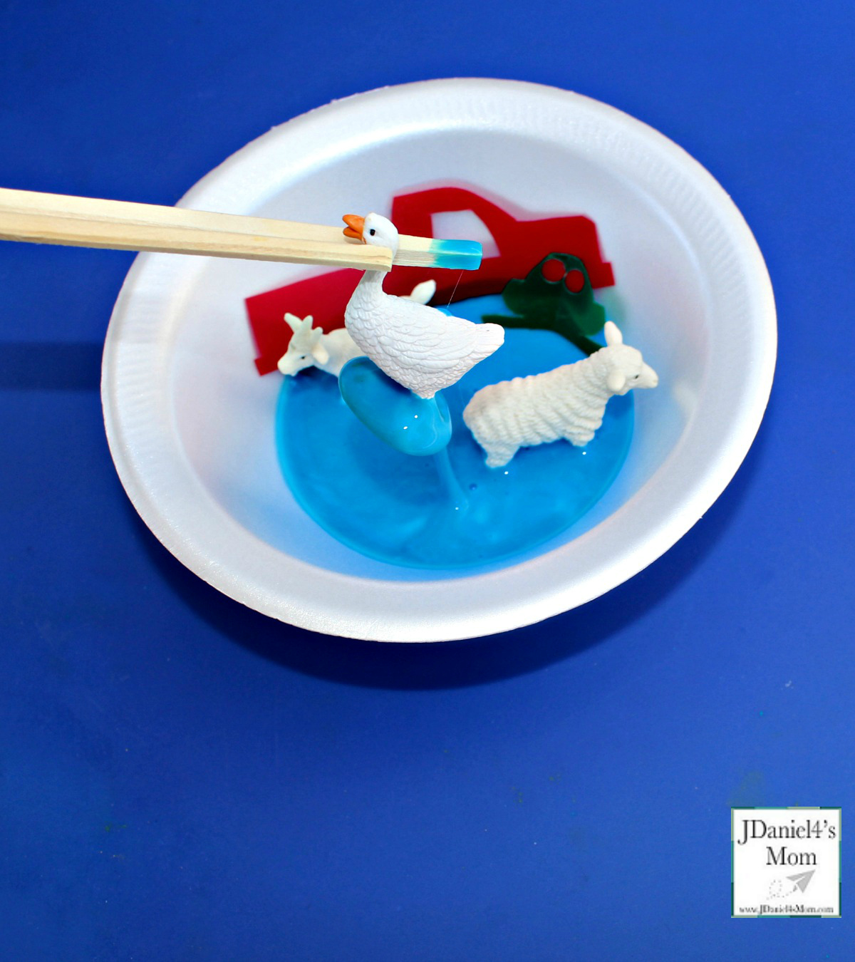 Slime Themed Duck in a Truck Fine Motor Activity - Taking out the duck
