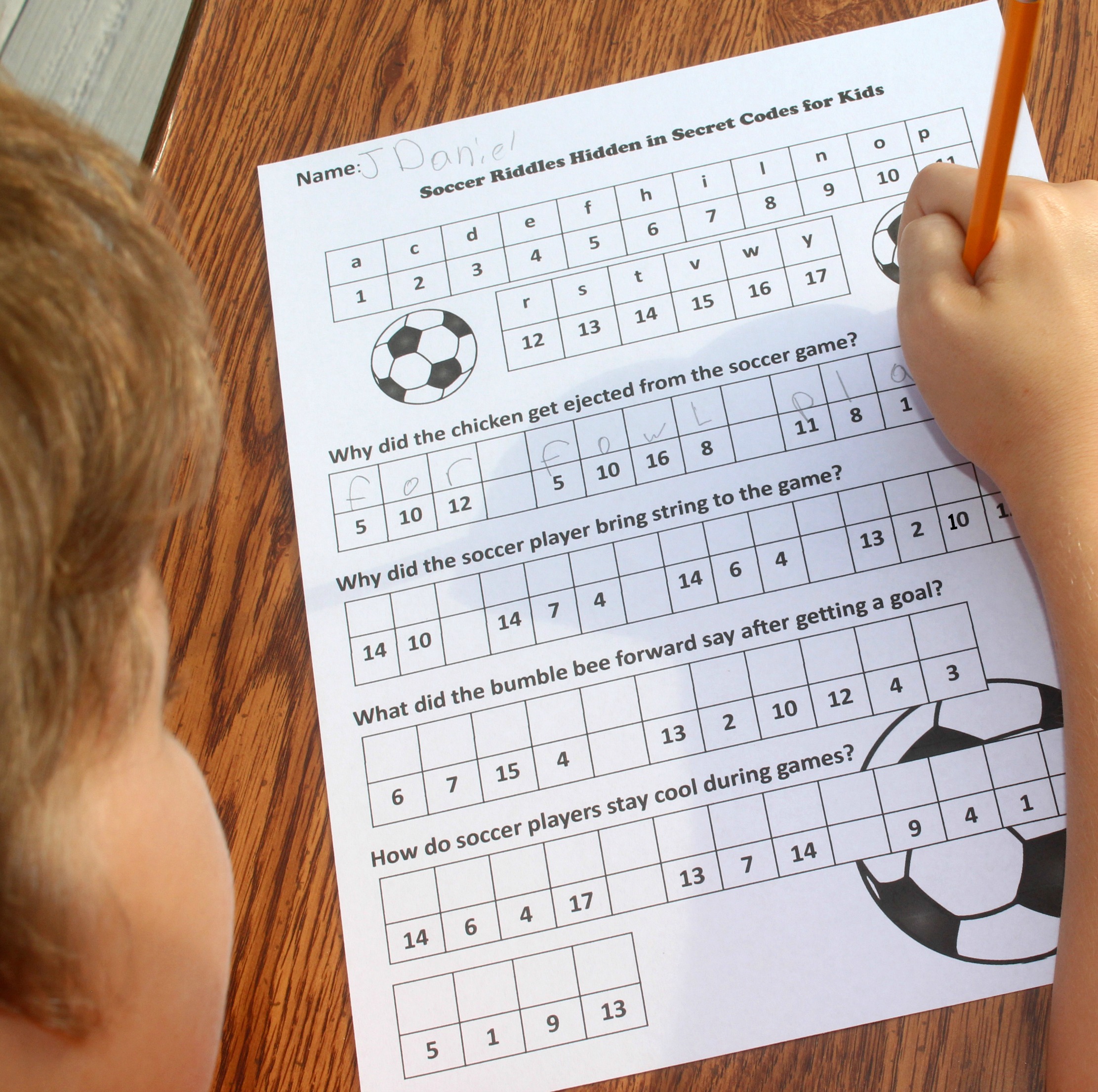 Soccer Themed Riddles Ready to Code Break - Working a one of the two riddle worksheets.