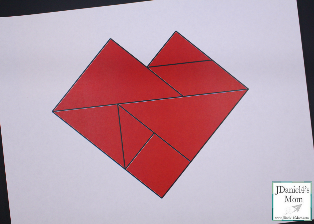 Valentine's Day Tangram Activity with Printables - This is part of a set that features printable Valetnine's Day with a small set of tangrams, a large set of tangrams, and a heart shaped pattern mat.