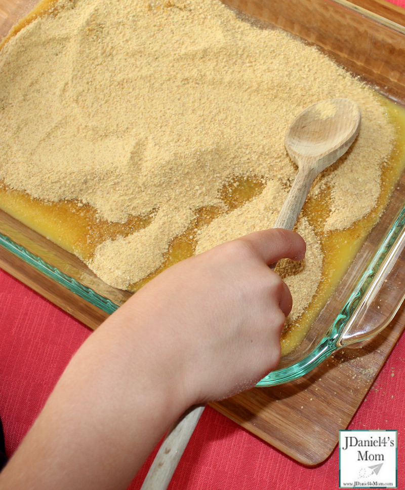 TEM Sedimentary Rock Cookie Recipe and Activity for Kids - Next you will add the graham cracker crumbs to the pan.
