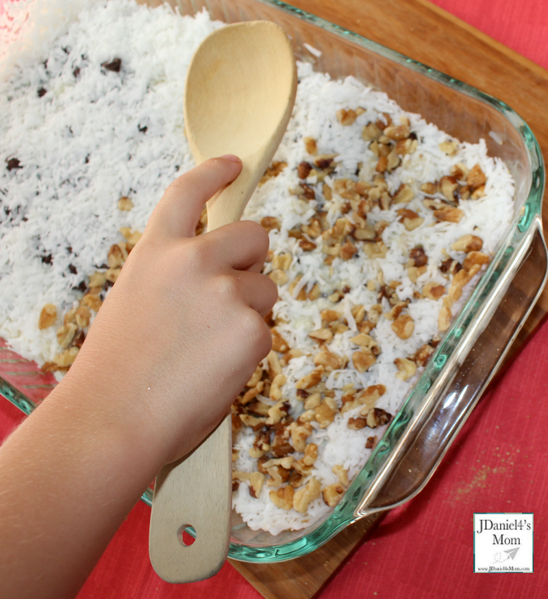 TEM Sedimentary Rock Cookie Recipe and Activity for Kids - Finally use a wooden spoon to compress the layers.