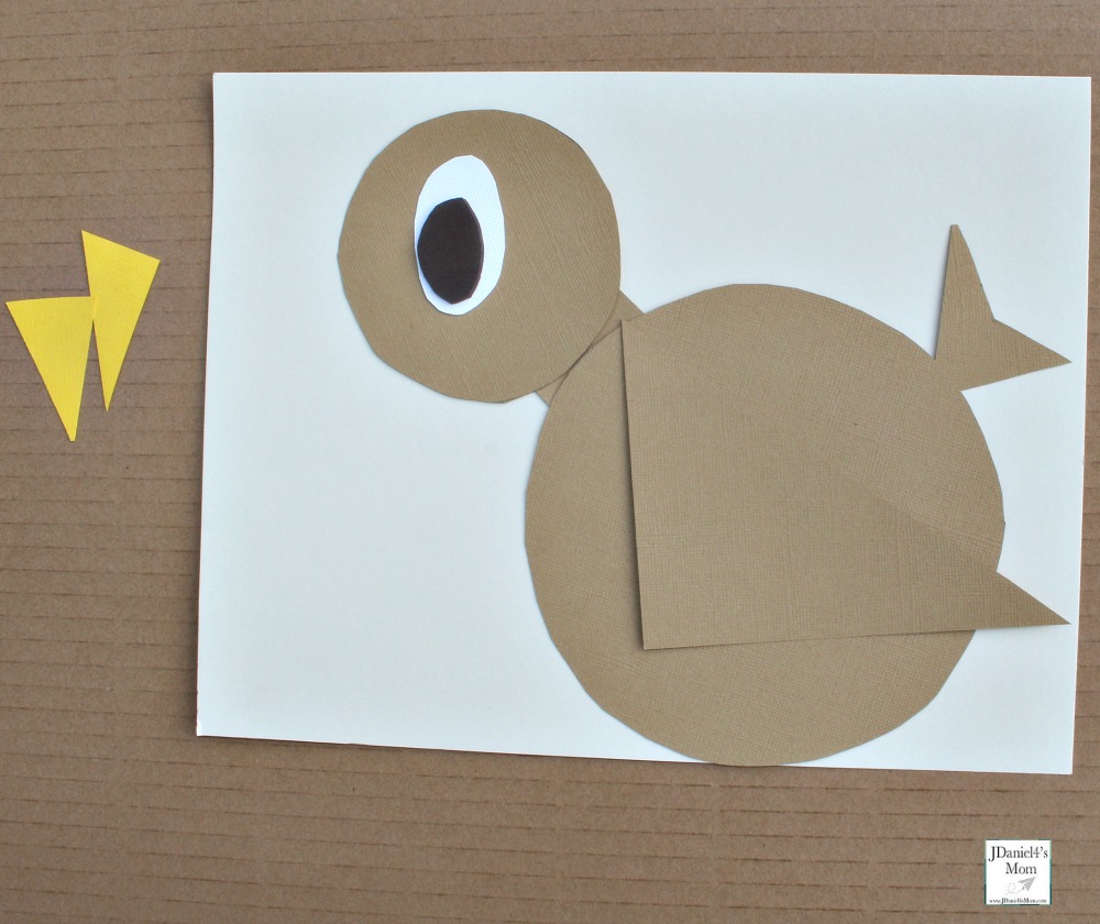Are You My Mother? Bird Shape Craft- Adding black eye section.