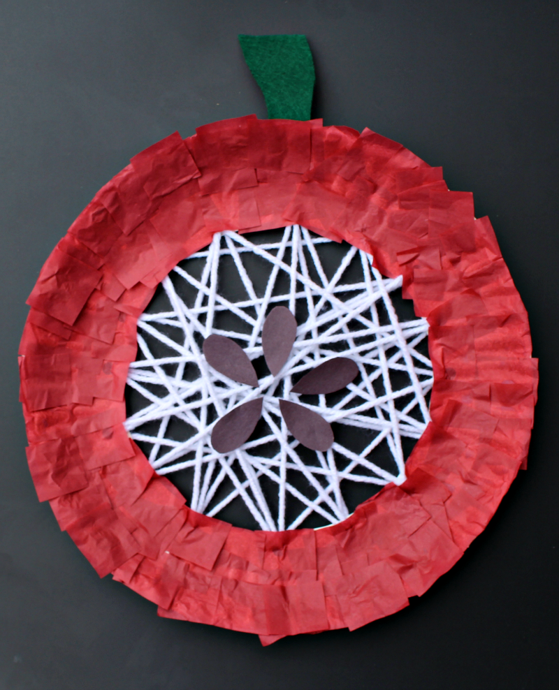 Apple Craft That Works on Fine Motor Skills - Adding Seeds and a Stem