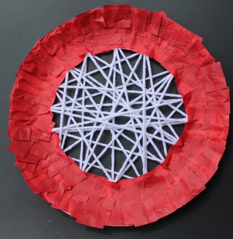 Apple Craft That Works on Fine Motor Skills - Adding Red Tissue