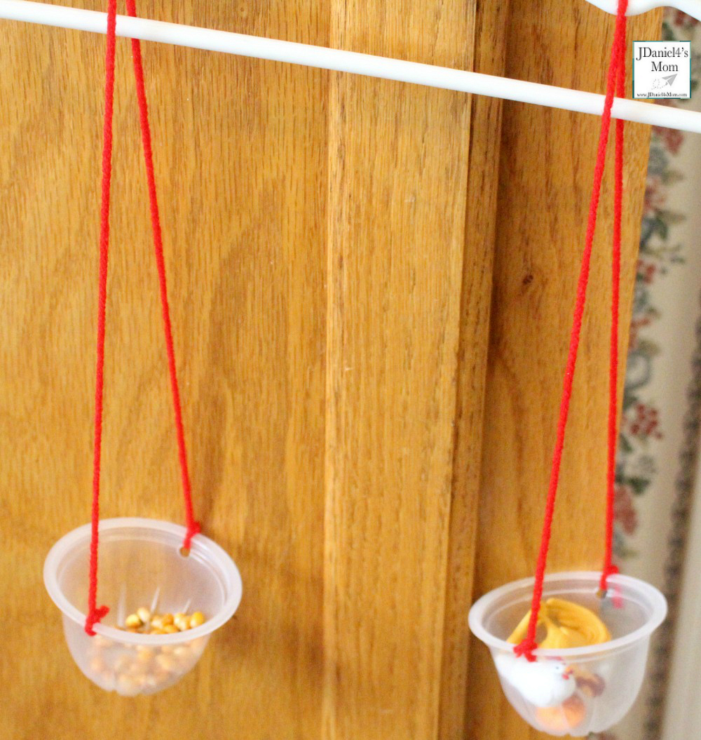 Help kids in building a balance scale as a STEM project