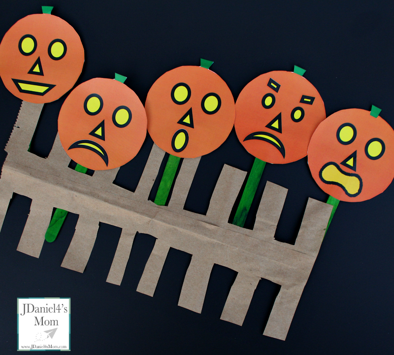 Five Little Pumpkins Social Skills Activities- A set of pumpkins and emotion cards are free to download. An original rhyme about five little pumpkins and feeling is shared in this post. This picture share feeling pumpkins as puppets on a fence.