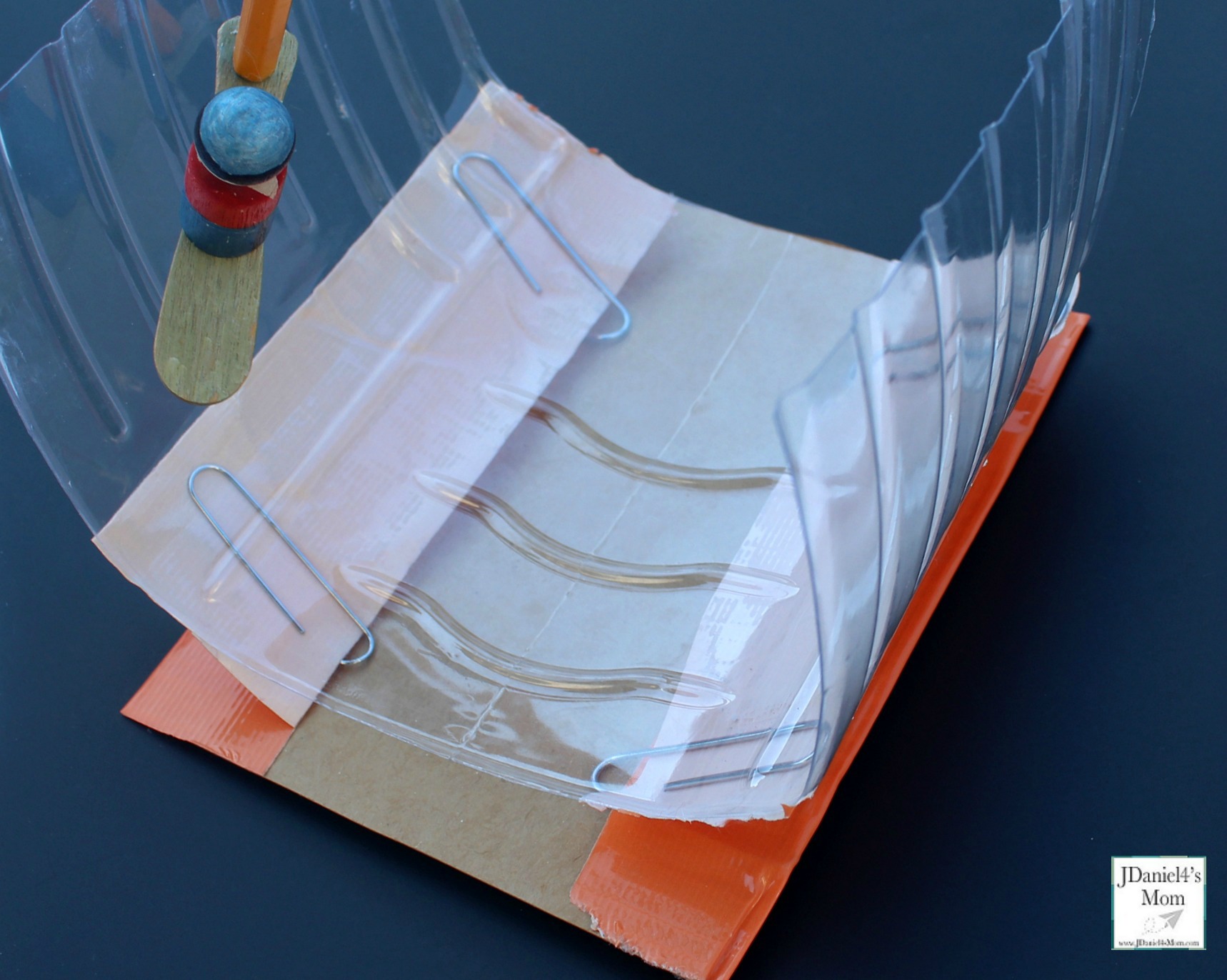 Winter Olympic Sports - STEM Snowboarding Halfpipe : This is a fun STEM activity that can be used for creative play. This view is of the paper clips duct taped down.