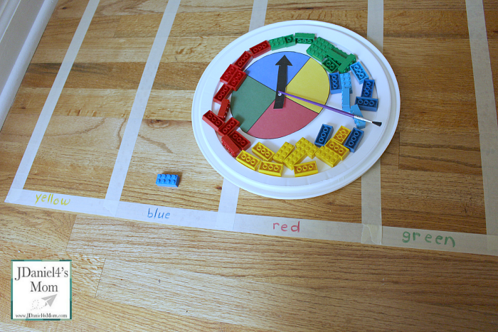Let's Create a Graph on the Floor and Gather Data- A printable spinner,LEGO and tape graph are a great way to explore collecting data and displaying it.
