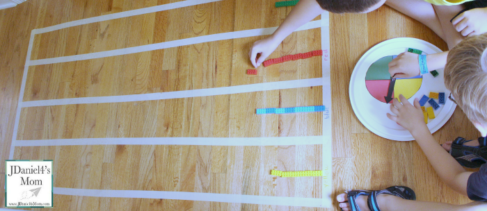 Let's Create a Graph on the Floor and Gather Data- A printable spinner,LEGO and tape graph are a great way to explore collecting data and displaying it.
