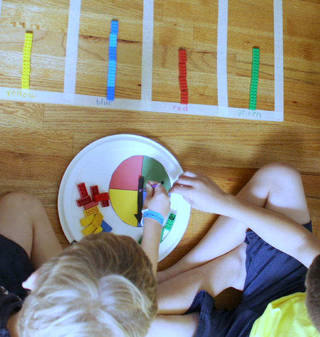 How to Create a Graph with Tape- A printable spinner,LEGO and tape graph are a great way to explore collecting data and displaying it.