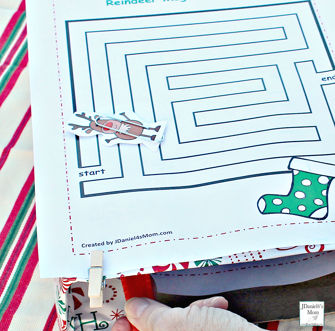 Reindeer Games with Magnets - Moving the reindeer over the maze and the magnet in the box.