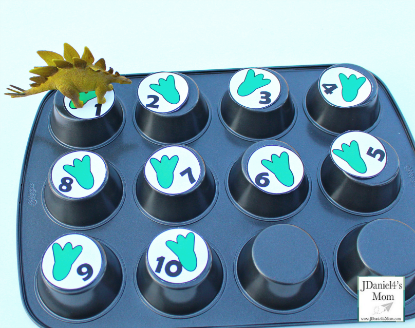 Dinosaur Activities for Kids That Explore Numbers - This printable set of numbers can be used in or on top of a muffin tin find numbers or create a number path.