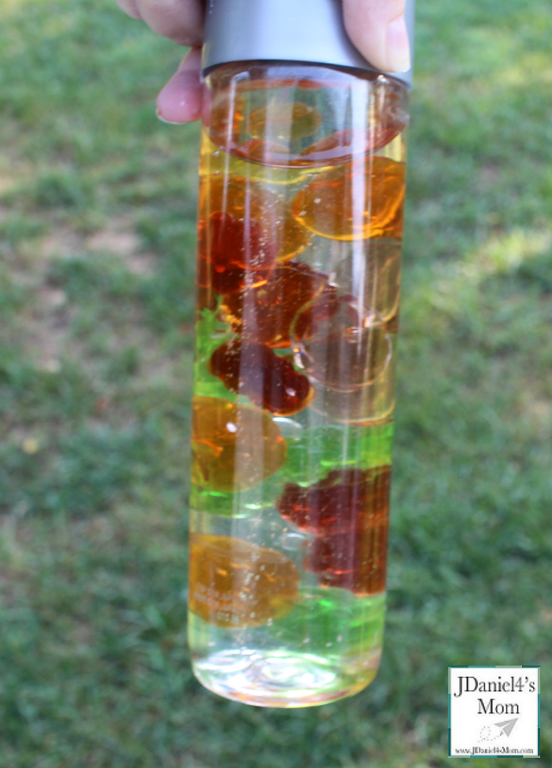 Preparing the Pumpkin Counting Cards Sensory Bottle Completed