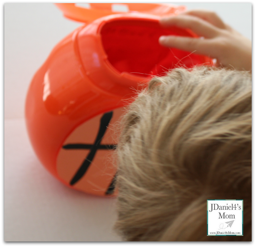 Slam Dunk- Fun Math Games : Game made from an old detergent container.