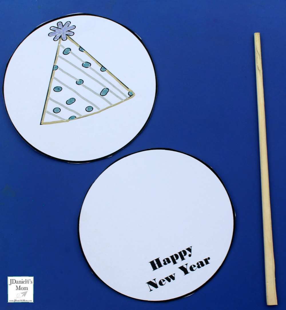 New Year's Thaumatrope Printable Set - Children at home and students at school can select from four designs for their thaumatrope. Here are the supplies you are going to need.